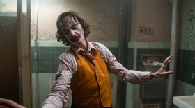 This image released by Warner Bros. Pictures shows Joaquin Phoenix in a scene from "Joker." On Monday, Jan. 13, the film was nominated for an Oscar for best picture.