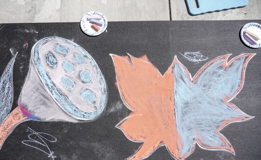 Chalk Walk was filled with children and adults creating art across the space provided by the Phillips Collection.