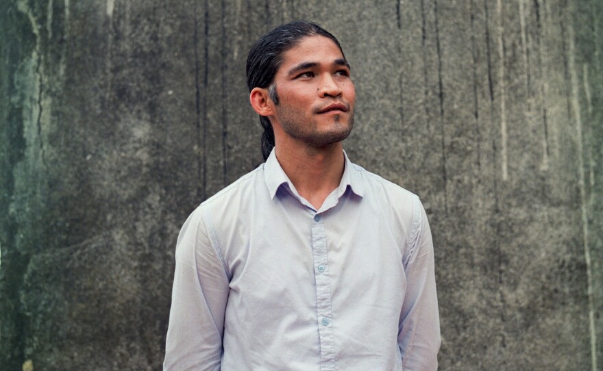 Basir Akbary, 29, from Afghanistan, moved to Turkey to study several years ago and now does translation work for a local organization helping Afghans. He says one of his brothers, who is still in Afghanistan, witnessed the bombing outside Kabul's airport last month. Another brother was recently beaten by the Taliban for wearing Western-looking clothing.