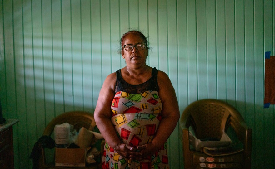 Chandroutie Persaud lived in a home with a flooded first floor for months. "Imagine, I used to wear long boots to go to my washroom," she says. It destroyed much of her home garden, as well as a season of rice and cash crops. "We carry great losses," she says.