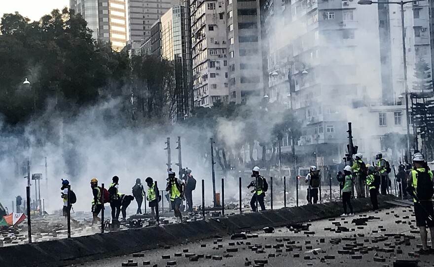 Police answered gasoline bombs hurled at them with rounds of tear gas.