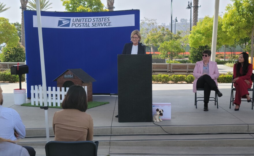 San Diego Postmaster Lisa Baldwin speaks at a postal service event in Mission Valley's Civita Park on June 2, 2022.