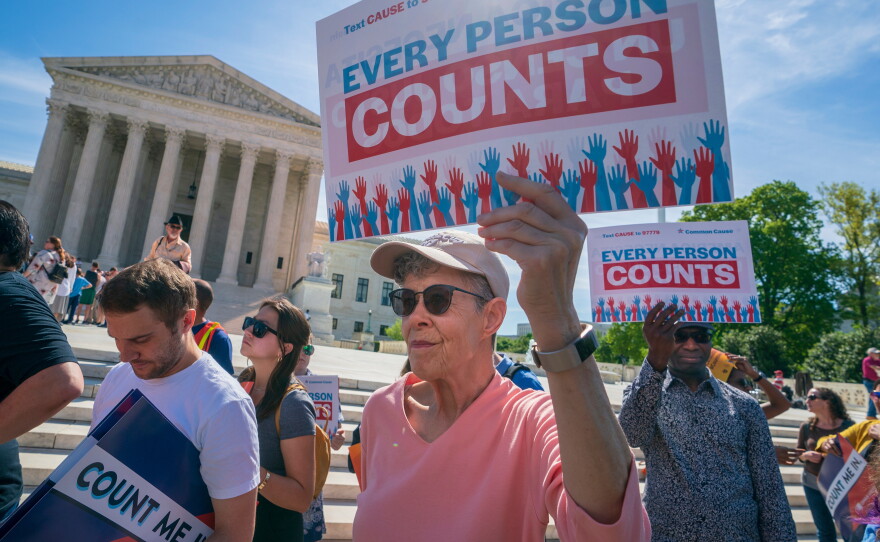 Demonstrators holding signs saying "EVERY PERSON COUNTS" rally outside the Supreme Court in 2019 in Washington, D.C., as the justices hear arguments over the first Trump administration's failed push to ask about U.S. citizenship status on the 2020 census.