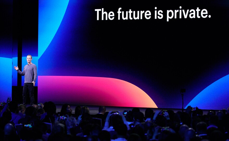 In this April 30, 2019 file photo, Facebook CEO Mark Zuckerberg, left, makes the keynote speech at F8, the Facebook's developer conference, in San Jose, Calif.