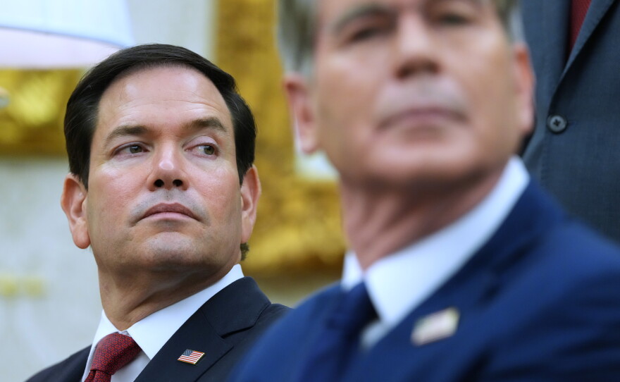 Secretary of State Marco Rubio, left, listen as President Donald Trump meets with Iraq's Prime Minister Ali al-Zaidi in the Oval Office of the White House, Tuesday, July 14, 2026, in Washington.