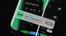 An ad for the prediction market app Kalshi is displayed on a mobile phone Thursday, April 16, 2026.