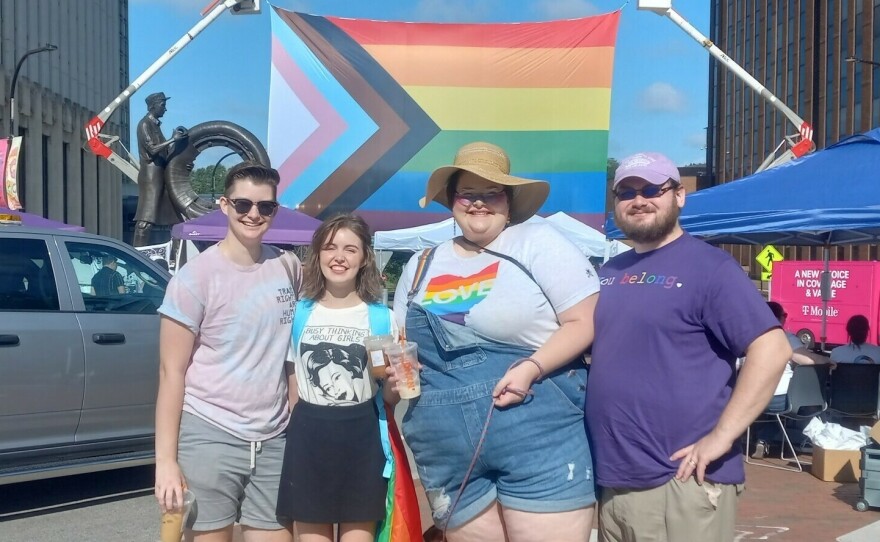 From left to right, Israel, Elizabeth, Tatiana and her husband at a Pride parade in summer 2022.