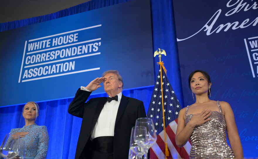 President Donald Trump attends the White House Correspondents' Association Dinner, at the Waldorf Astoria Washington DC, Friday, July 24, 2026, in Washington, with with WHCA president Weijia Jiang, right and White House press secretary Karoline Leavitt.