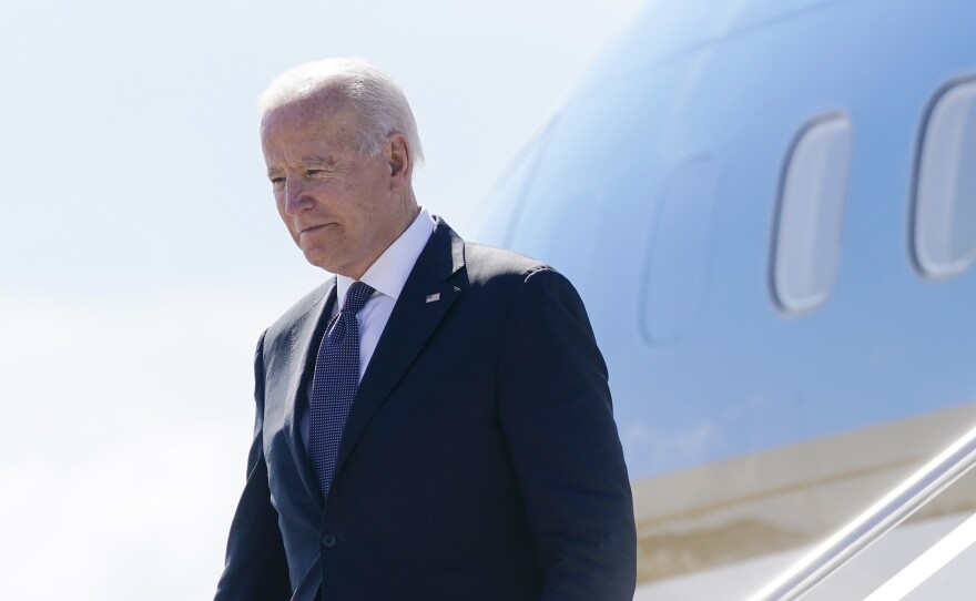 President Biden steps off Air Force One at Geneva Airport on Tuesday. Biden is scheduled to meet with Russian President Vladimir Putin on Wednesday.