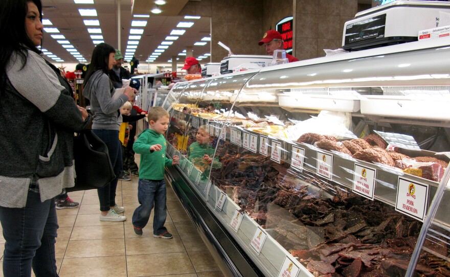 Customers line up at the jerky bar at Buc-ee's in New Braunfels, Texas. Buc-ee's bills itself as the largest convenience store in the world and sells 37 different kinds of jerky.