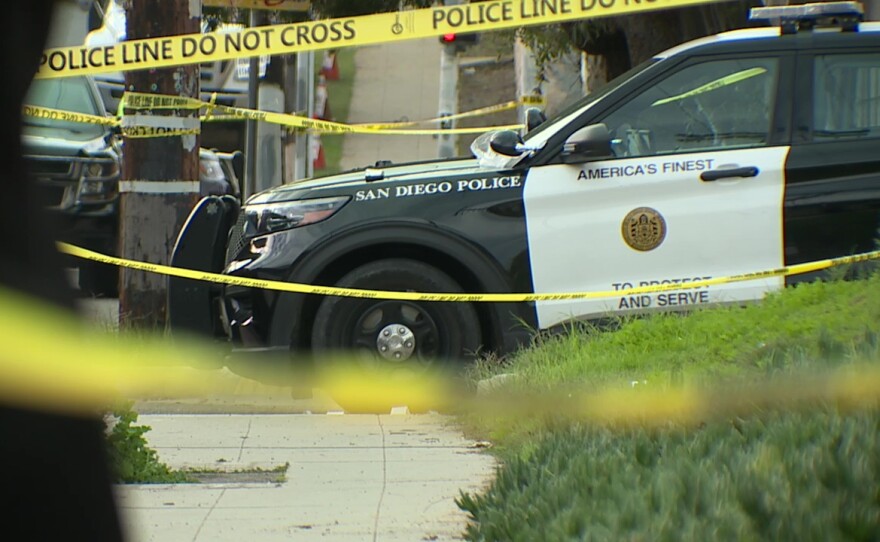 The taped-off scene at a fatal shooting involving San Diego police officers and an armed-robbery suspect in the Stockton neighborhood on Jan. 10, 2021.