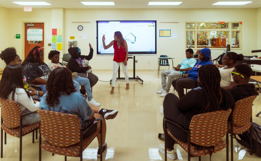Walls speaks to members of the grief support group, Steve's Club. She openly shares her own experiences with grief with her students. "My father's been gone 44 years, and it's a roller-coaster," she said at a recent meeting. Grief "just smacks you in the face some days."