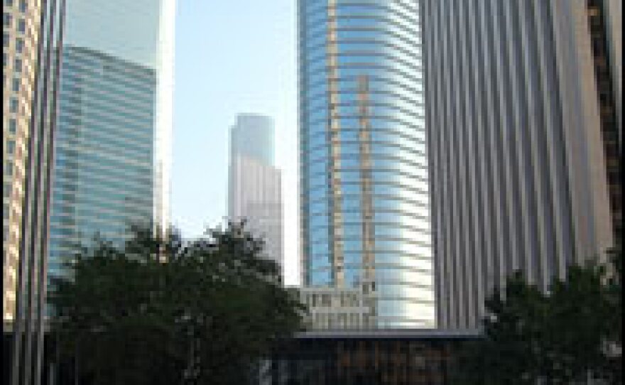 State officials urged residents to stay away from Houston until Monday. Downtown Houston on Sunday morning was nearly deserted.