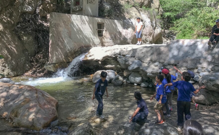 School kids enjoy the water in Eaton Canyon near Altadena, Calif.