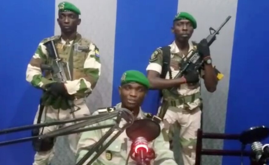 A still image taken from a video posted Monday shows a military officer who identified himself as Lt. Kelly Ondo Obiang giving a statement from a radio station in Libreville, Gabon. In it, he urged citizens to take control of the streets to support a coup.