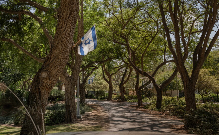 Trees line a road inside Kibbutz Nir Oz in southern Israel on Aug. 31, 2026, amid efforts to rebuild communities near the Gaza border after the Hamas-led attacks of Oct. 7.