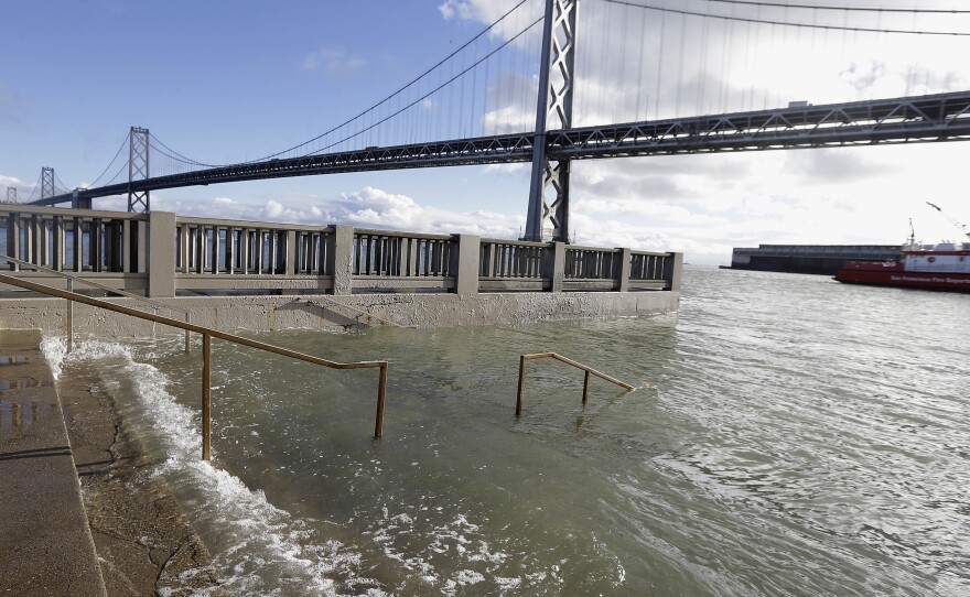 Water from a "king tide" floods a staircase along the Embarcadero in San Francisco in January 2017.