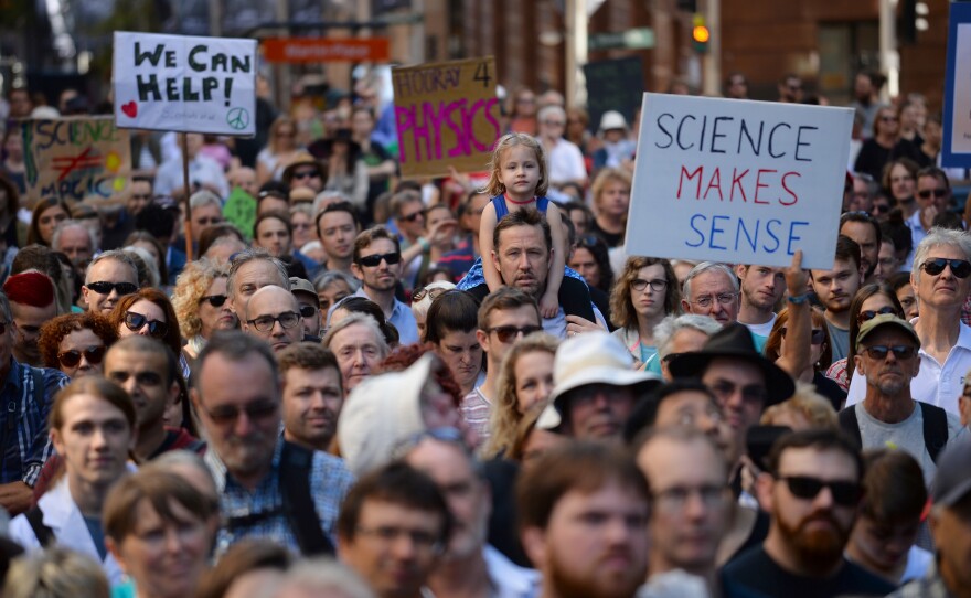 Supporters of science and research gather for the March for Science protest in Sydney. Thousands of people rallied in Australia and New Zealand.