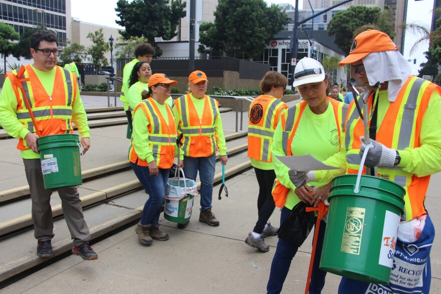 Volunteers at the downtown cleanup event on July 13, 2024 wearing neon shirts purchased by San Diegans Together Tackling Homelessness. The shirts are the initiative's only expenditure to date.