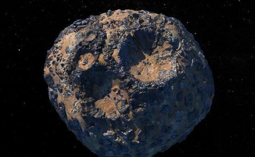 This artist's conception shows what a metal-rich asteroid like Psyche might look like, but scientists really aren't sure what they'll see.