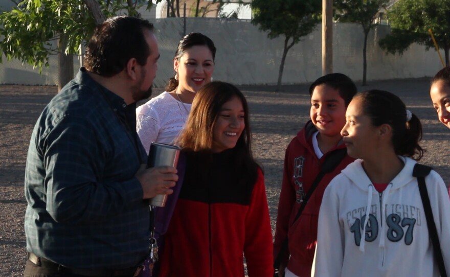 Columbus Elementary Principal Armando Chavez talks to kids who cross the port of entry to go to school, May 24, 2016.