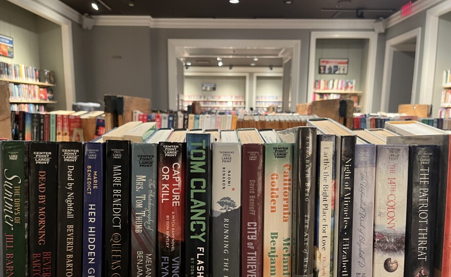 Books line the shelves of a former Abercrombie &amp; Fitch at the Escondido Public Library, Aug. 26, 2025.