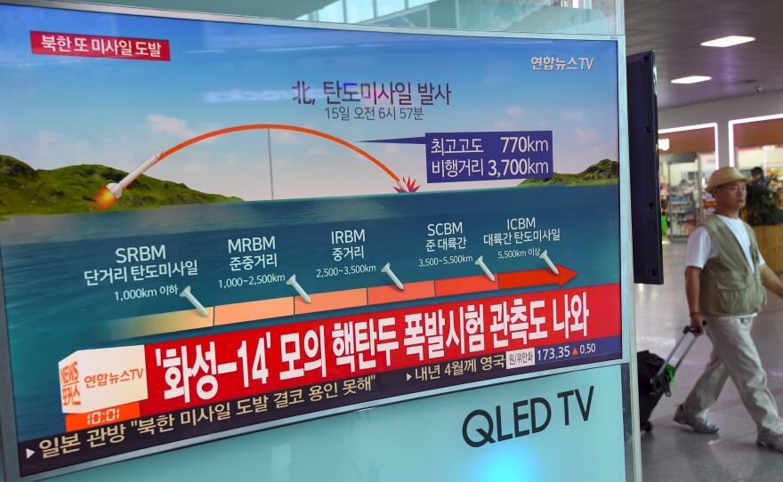A screen at a railway station in Seoul on Friday shows a news graphic of a North Korean missile launch. President Trump said on Thursday there would be additional sanctions on North Korea.