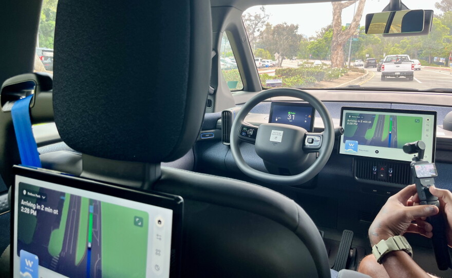 An inside view of a driverless Ojai Waymo vehicle shows the car navigating the roads around Balboa Park, Aug. 20, 2026.