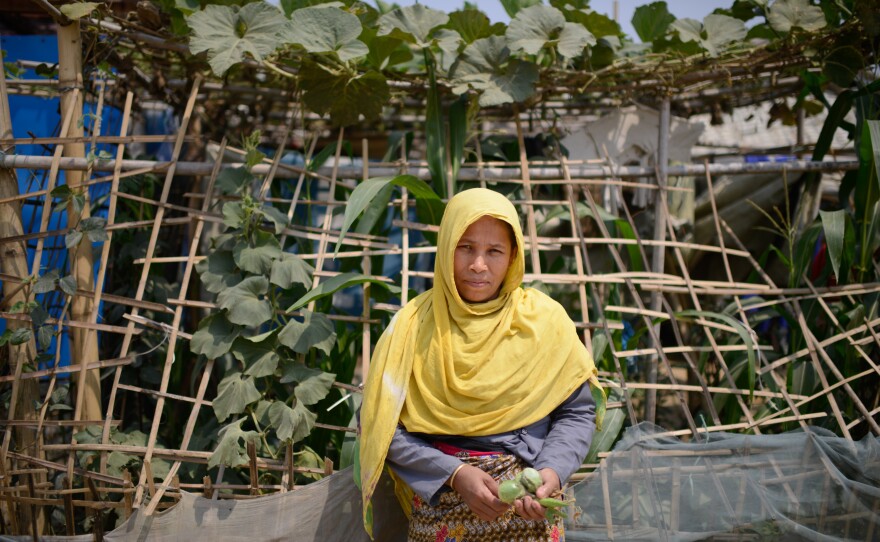 Fatima Katu, 40, has started a small garden at her home in the refugee camp. Compared to her previous shelter in the camp, she says, "We have more space here and now it feels like home."