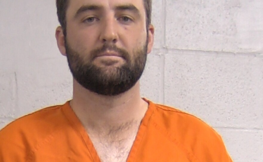 Scottie Scheffler is seen in a police booking photo after being arrested for refusing to stop at a traffic barricade while trying to enter the Valhalla Golf Course on Friday in Louisville, Ky.
