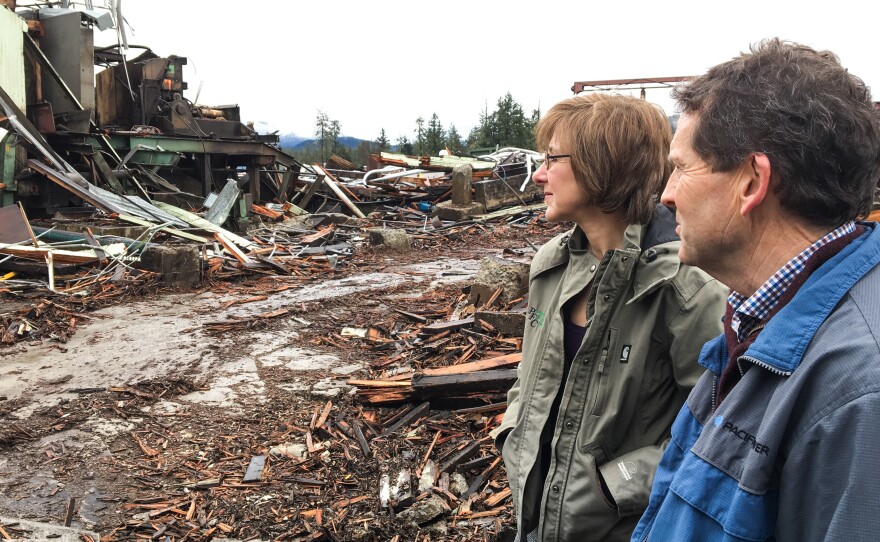 Link and Jennifer Phillippi, co-owners of Rough and Ready Lumber in Cave Junction, Ore. survey the remnants of their saw mill. The mill shut down for good in February 2016. What's not been claimed in auction is being torn down.