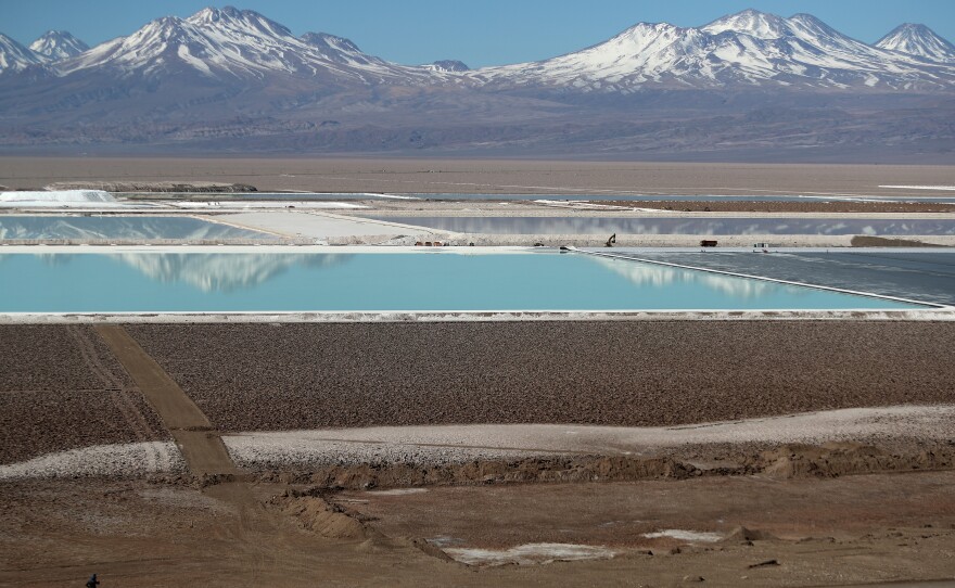 Brine pools from a lithium mine owned by U.S.-based Albemarle Corporation are seen in the Atacama desert, Chile, on Aug. 16, 2018. Mines like these are the start of a global supply chain for battery materials that has become critically important as electric vehicles rise in popularity.
