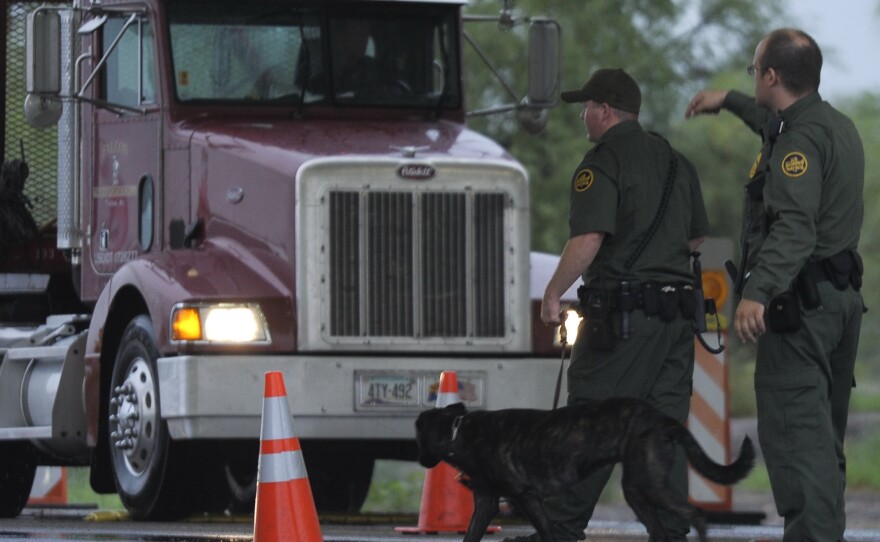 Border security agents stop a truck at a checkpoint on the way to Nogales, Ariz. More winter produce enters the U.S. at the border crossing than at any other point of entry in the country.