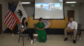 From left to right: Thao Ha, Zahra Hajee, Harris Mojadedi (on screen), and Indroneal Banerjee discuss immigration enforcement at a labor union building in Kearny Mesa on Wednesday, Oct. 1, 2025.