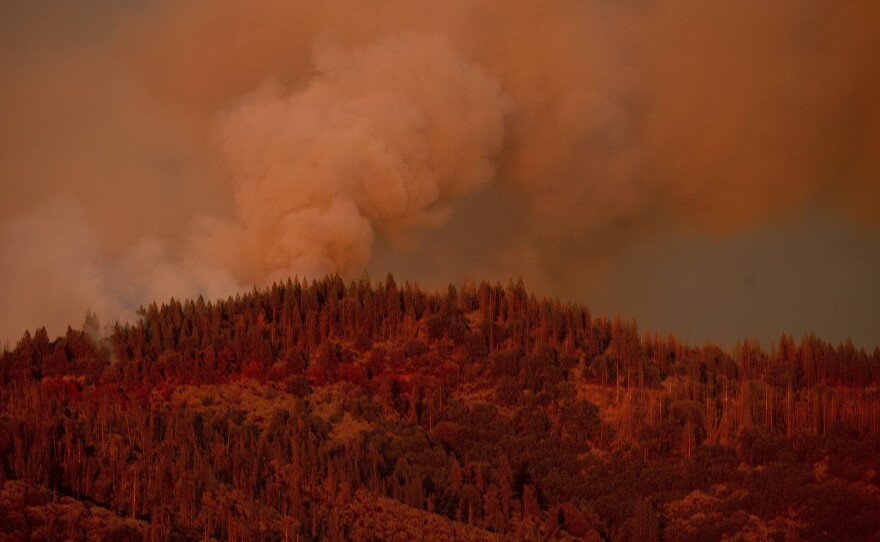 The Ferguson Fire burns along a ridgeline in unincorporated Mariposa County, Calif, on Monday, July 16, 2018.