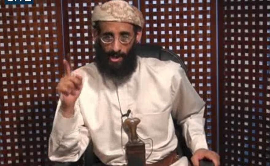 A Nov. 2010 file image of Anwar al-Awlaki taken from video and released by SITE Intelligence Group.