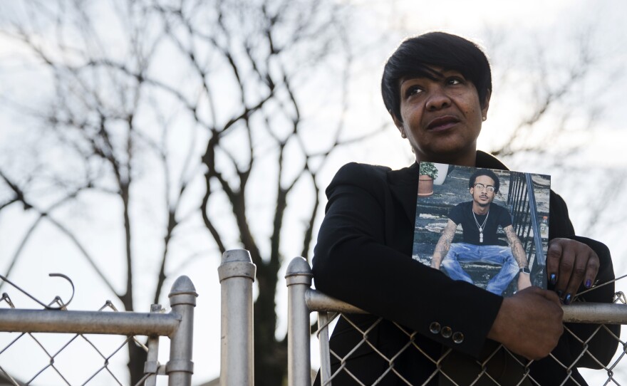 On Dec. 21, 2017, Trina Singleton holds a photo of her eldest son Darryl who was murdered in 2016. The Philadelphia Obituary Project, a new website, is working to show that homicide victims in Philadelphia are more than statistics.