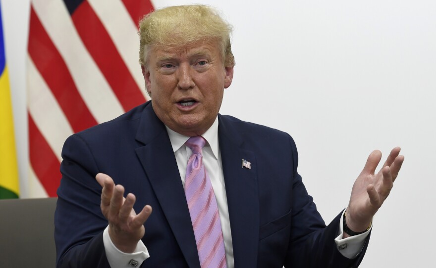 President Donald Trump at the G-20 economic conference in Osaka, Japan, Friday. He tweeted an invitation for North Korean leader Kim Jong Un to meet him after the summit in the demilitarized zone between the Koreas.