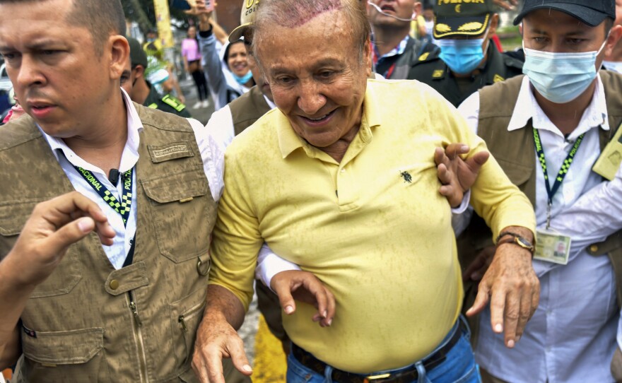 Rodolfo Hernandez, presidential candidate with the Anti-corruption Governors League, leaves a polling station after voting in presidential elections in Bucaramanga, Colombia, Sunday, May 29, 2022.