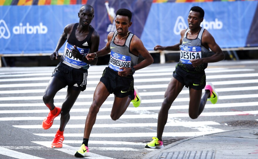 Ghirmay Ghebreslassie of Eritrea (center) Lucas Rotich of Kenya (left) and Lelisa Desisa of Ethiopia, during the New York City Marathon.
