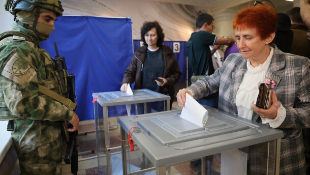 Voters cast ballots at a polling station during Russia's parliamentary election, in the Russian-controlled part of the Donetsk region, Ukraine, Friday, Sept. 18, 2026.