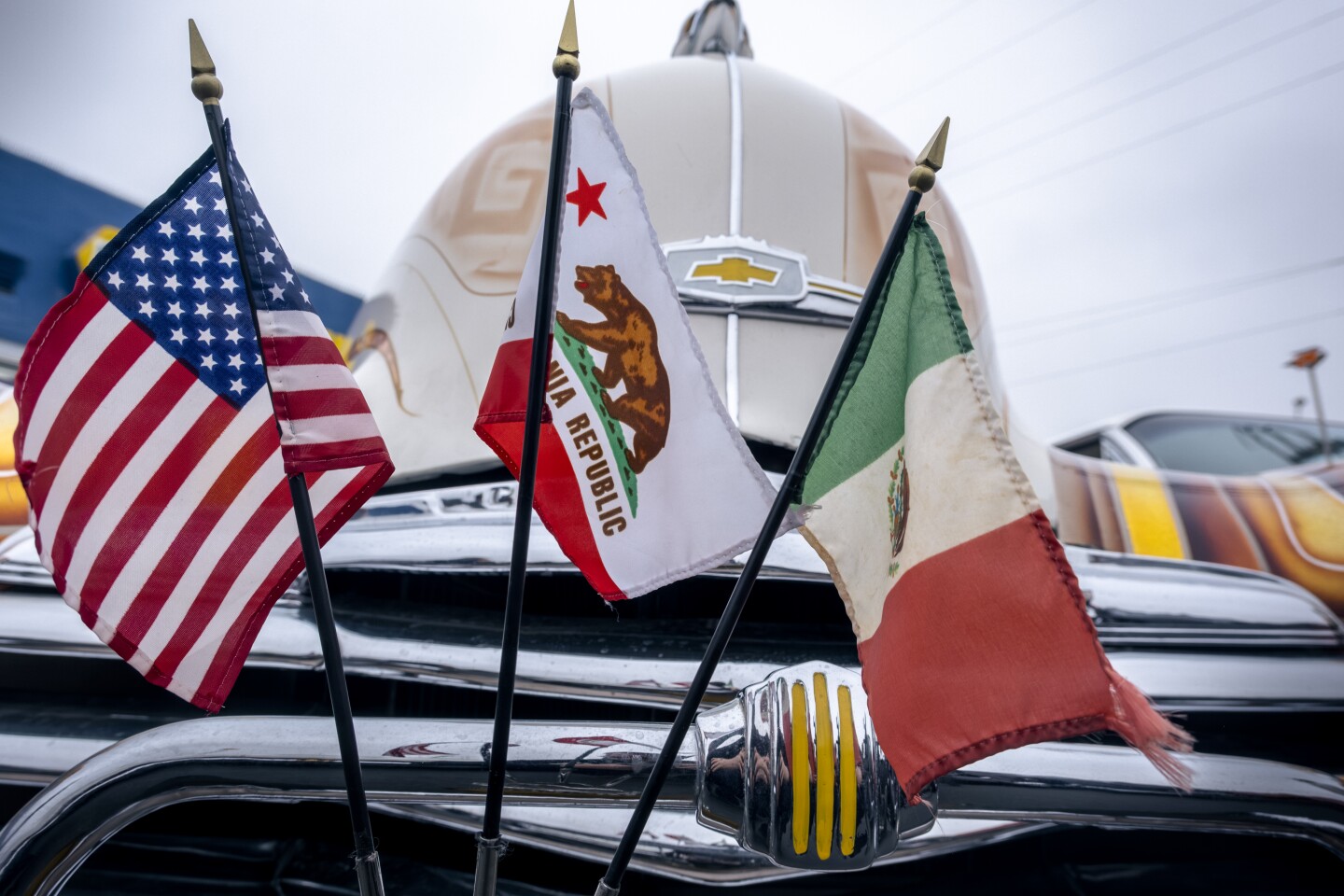 Many of the lowriders that came out to celebrate the removal of National City’s last “Cruising Prohibited” sign flew American and Mexican flags to honor the Mexican-American routs of lowrider culture, National City, May 19, 2023.