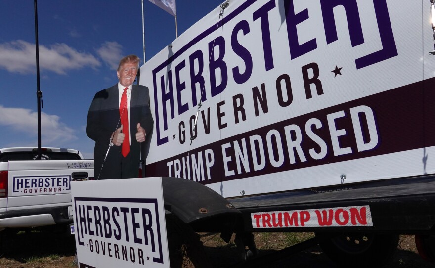 Campaign posters supporting Nebraska Republican candidate for governor Charles Herbster decorate the grounds of the I-80 Speedway prior to the start of a rally with former President Donald Trump on May 1 in Greenwood, Neb.