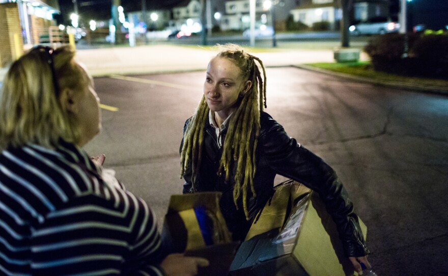 Tina Wolf (right) chats with Teri Kroll, a community overdose prevention activist, after a training event in Lindenhurst, N.Y. Kroll lost her son to an overdose in 2009, but has since revived a stranger with Narcan.