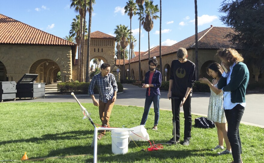 Students prepare a rocket launch for a science class on the campus of Stanford University in Palo Alto, Calif.