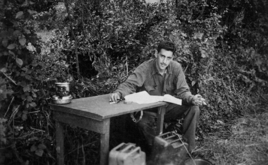The only photo during WWII of Salinger writing "The Catcher in the Rye."