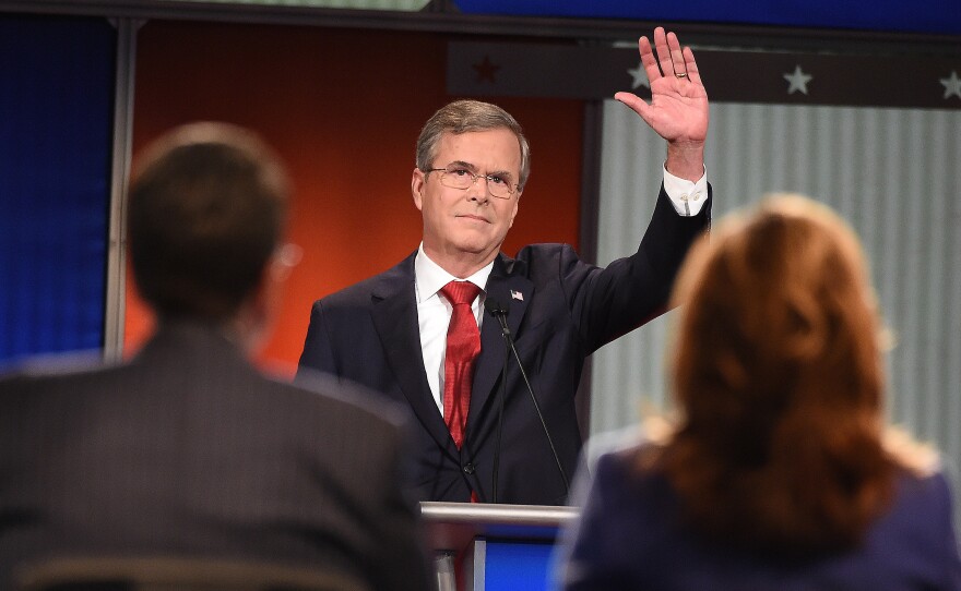Republican presidential candidate and former Florida Gov. Jeb Bush waves to the audience during the Fox Business Network Republican presidential debate Thursday.