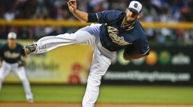San Diego Padres starting pitcher James Shields follows through with a pitch during the first inning of a spring training baseball game against the Los Angeles Dodgers in Peoria, Arizona, March 12, 2015.