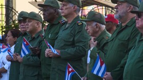 Cuban President Miguel Diaz-Canel, center, attends a celebration marking the 65th anniversary of the proclamation declaring the Cuban Revolution socialist, in Havana, Cuba, Thursday, April 16, 2026.