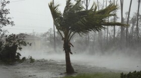 A road is flooded during the passing of Hurricane Dorian in Freeport, Grand Bahama, Bahamas, Monday, Sept. 2, 2019